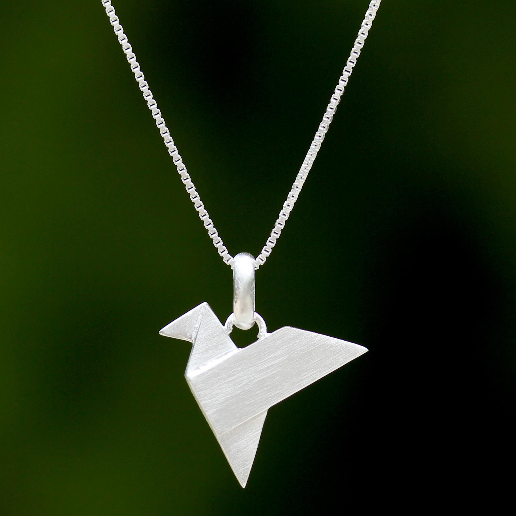 Dainty paper airplane necklace in silver. Origami Airplane