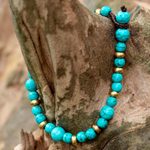 Beaded bracelet, 'Beautiful Thai in Light Blue' - Brass and Calcite Beaded Bracelet from Thailand