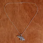 Garnet and marcasite pendant necklace, 'Glittering Elephants' - Garnet and Marcasite Elephant Pendant Necklace from Thailand