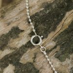 Garnet and marcasite pendant necklace, 'Glittering Elephants' - Garnet and Marcasite Elephant Pendant Necklace from Thailand