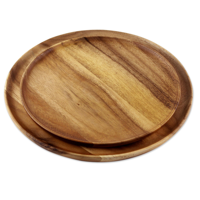 Wood plates, 'Planetary Meal' (pair) - Two Handcrafted Raintree Wood Plates from Thailand