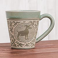 Celadon ceramic mug, 'Thai Zodiac Dog' - Celadon Glazed Ceramic Mug with Dog from Thailand