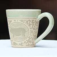 Celadon ceramic mug, 'Thai Zodiac Pig' - Celadon Glazed Ceramic Mug with Pig from Thailand