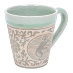 Celadon ceramic mug, 'Thai Zodiac Monkey' - Celadon Glazed Ceramic Mug with Monkey from Thailand