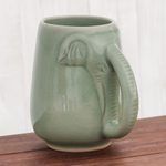Celadon ceramic mug, 'Morning Elephant in Green' - Ceramic Celadon Elephant Mug in Green from Thailand