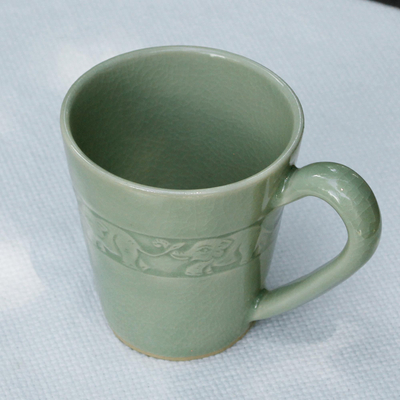 Celadon ceramic mug, 'Elephant Babies' - Hand Crafted Celadon Ceramic Elephant Mug from Thailand