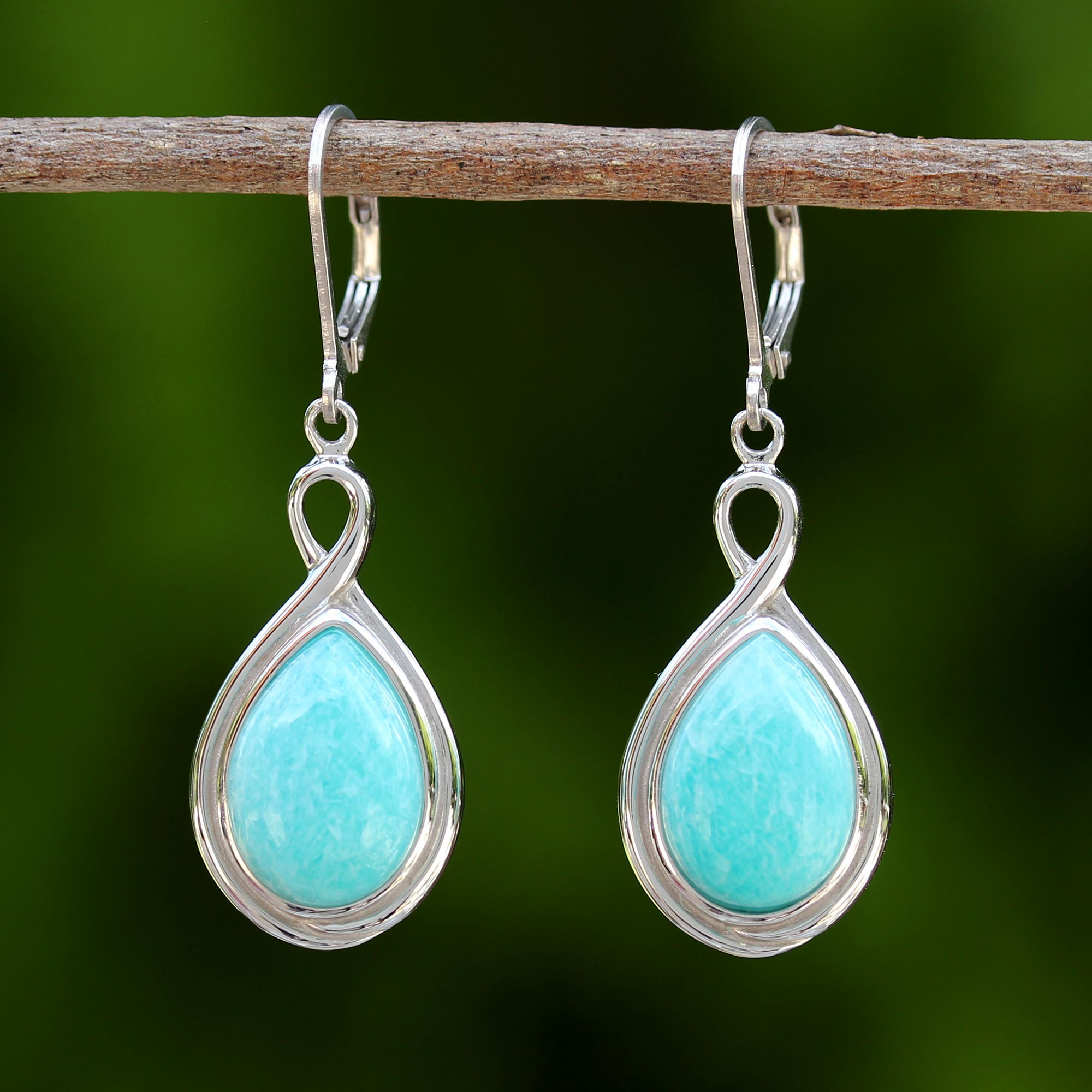 A PAIR OF TURQUOISE BLUE  SILVER PLATED DANGLY EARRINGS NEW.