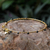 Gold plated onyx bangle bracelet, 'Floral Berries' - Gold Plated Onyx Floral Bangle Bracelet from Thailand (image 2) thumbail