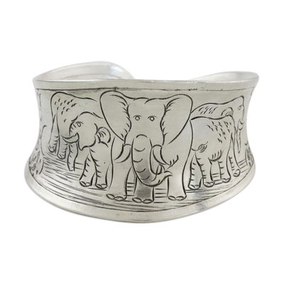 Sterling silver cuff bracelet, 'Lanna Elephants' - Elephant-Themed Sterling Silver Cuff Bracelet from Thailand