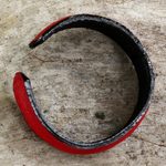 Leather cuff bracelet, 'Simply Red' - Hand Crafted Unisex Red Leather Cuff Bracelet from Thailand
