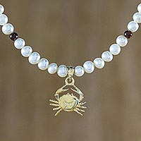 Gold plated cultured pearl and garnet pendant necklace, 'Radiant Cancer' - Gold Plated Cultured Pearl and Garnet Cancer Necklace
