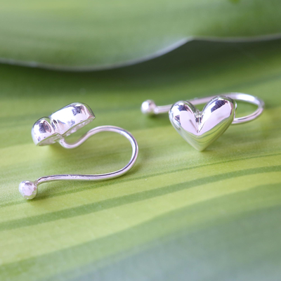 Sterling silver ear cuffs, 'Demure Hearts' - Sterling Silver Heart Ear Cuffs Artisan Crafted in Thailand