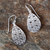 Sterling silver dangle earrings, 'Frangipani Drops' - Sterling Silver Drop-Shaped Dangle Earrings from Thailand