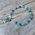 Blue agate beaded bracelet, 'Cross by the Sea' - Blue Agate and Sterling Silver Cross Bracelet from Thailand thumbail