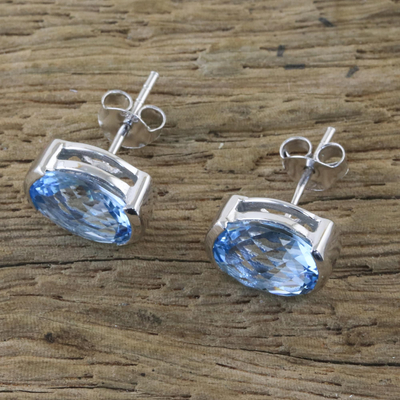 Blue topaz stud earrings, 'Precious Gift' - Rhodium Plated Blue Topaz Stud Earrings from Thailand