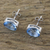Blue topaz stud earrings, 'Precious Gift' - Rhodium Plated Blue Topaz Stud Earrings from Thailand (image 2b) thumbail