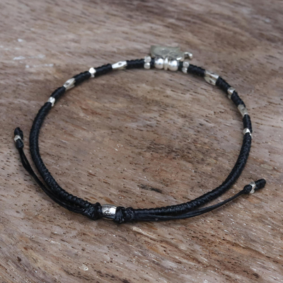 Silver accented cord bracelet, 'Elephant Luck' - Artisan Crafted Black Bracelet with Hill Tribe Silver Charm