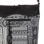 Leather accent cotton blend sling bag, 'Sophisticated Journey' - Leather Accent Cotton Blend Sling in Black and White