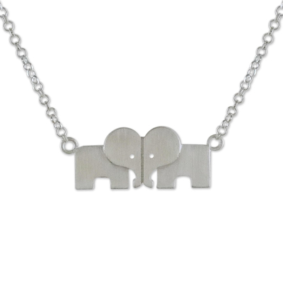 Sterling silver pendant necklace, 'Elephant Bond' - Sterling Silver Loving Elephant Necklace from Thailand