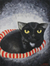 'Lächelnde schwarze Katze - Signierte Naif-Malerei einer schwarzen Katze aus Thailand