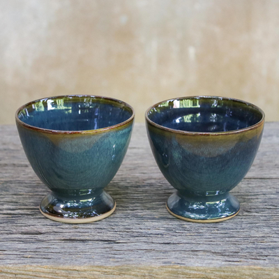 Ceramic teacups, 'Mood Indigo' (pair) - Indigo Blue Footed Ceramic Teacups from Thailand (Pair)
