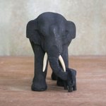 Teak wood sculpture, 'Heading Home' - Teak Wood Elephant Statuette from Thailand