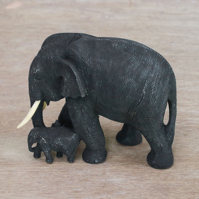 Teak wood sculpture, 'Heading Home' - Teak Wood Elephant Statuette from Thailand