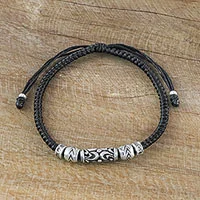 Silver beaded cord bracelet, 'Ancient Spirit' - Thai Artisan Crafted Silver Beaded Ebony Cord Bracelet