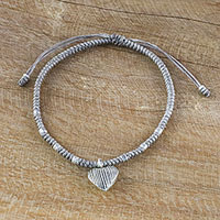 Silver charm cord bracelet, 'Ancient Heart in Grey' - Grey Cord Heart Charm Bracelet with Hill Tribe Silver