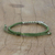 Silbernes Bettelarmband - Silbernes Om-Charm-Armband an geflochtenen grünen Kordeln