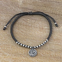 Silver charm bracelet, 'Ancient Om in Black' - Black Cord Bracelet with 950 Silver Om Charm