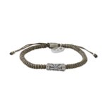 Silver accented cord bracelet, 'New Dawn' - Grey Cord Flower Motif Bracelet with Silver Peace Charm