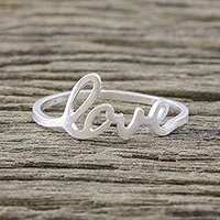 Sterling silver band ring, 'Gleaming Love' - Love-Themed Sterling Silver Band Ring from Thailand