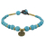 Brass beaded charm bracelet, 'Andaman Waves' - Turquoise Colored Bead Bracelet with Brass Charm thumbail