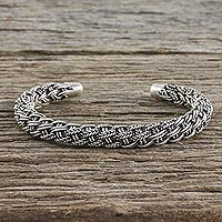 Sterling silver cuff bracelet, 'Thai Braid' - Handcrafted Sterling Silver Cuff Bracelet from Thailand
