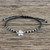 Silver beaded cord charm bracelet, 'Flower Charm' - 950 Silver Flower Charm Bracelet on Black Cords (image 2) thumbail
