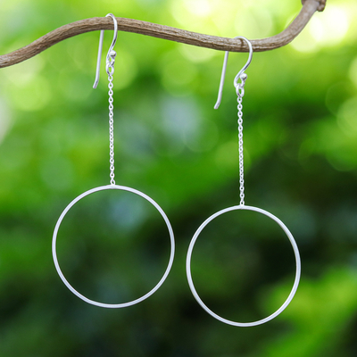 Sterling silver dangle earrings, 'Breezy Circle' - Thai Matte Finish Sterling Silver Circle Dangle Earrings