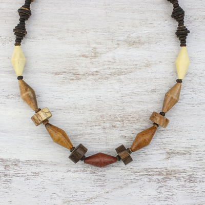 Wood and coconut shell beaded necklace, 'Summer Traveler' - Wood and Coconut Shell Long Bead Necklace from Thailand