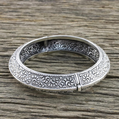 Sterling silver bangle bracelet, 'Spiraling Vines' - Handcrafted Sterling Silver Bangle Bracelet from Thailand