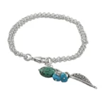 Silver charm bracelet, 'Lively Leaf' - Silver and Recon Turquoise Leaf Bracelet from Thailand