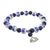 Lapis lazuli and ceramic beaded charm bracelet, 'Ming Lotus' - Blue and White Beaded Stretch Bracelet from Thailand