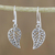 Sterling silver dangle earrings, 'Swirling Leaves' - Spiraling Leaf-Shaped Sterling Silver Earrings from Thailand