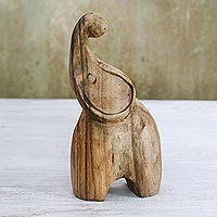 Wood statuette, 'Joyful Elephant' - Handmade Raintree Wood Elephant Statuette from Thailand