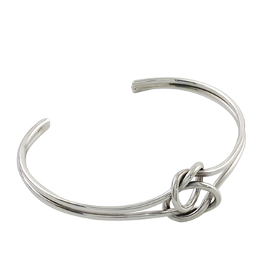 Sterling silver cuff pendant bracelet, 'Happy Together' - Sterling Silver Wire Cuff Bracelet with Center Knot