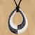 Ceramic pendant necklace, 'Monochrome Magic' - Adjustable Black and White Ceramic Teardrop Pendant Necklace