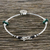 Malachite beaded charm bracelet, 'Harnessed Energy' - Malachite Bead and Hill Tribe Silver Disc Charm Bracelet