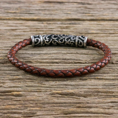 Leather braided pendant bracelet, 'Ancient Cross in Brown' - Leather Cross Pendant Bracelet in Brown from Thailand