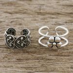 Sterling silver ear cuffs, 'Flower Love' - Floral and Heart Motif Sterling Silver Ear Cuffs