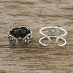 Sterling silver ear cuffs, 'Flower Love' - Floral and Heart Motif Sterling Silver Ear Cuffs