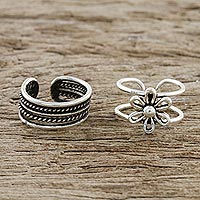 Sterling silver ear cuffs, 'Boutique Garden' - Floral and Patterned Sterling Silver Ear Cuffs from Thailand